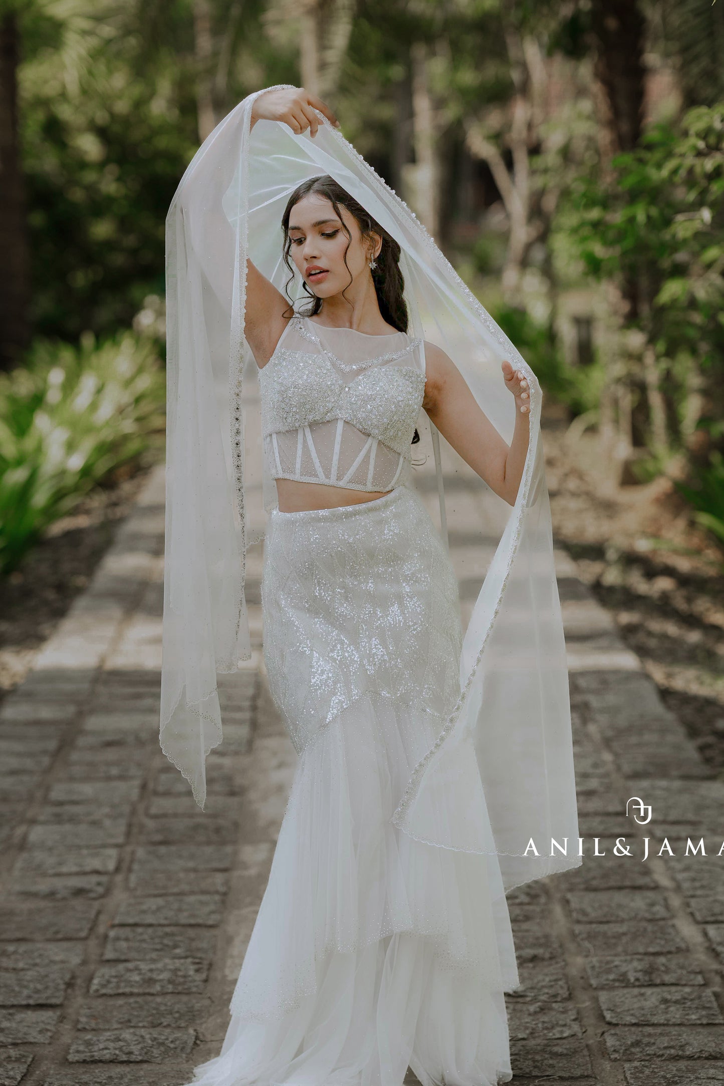 Paris white lehenga with crystals and gems