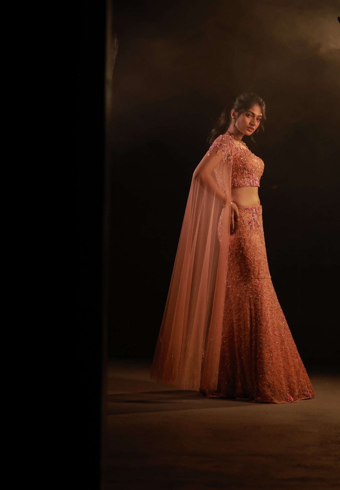 Orange bridal corset lehenga.