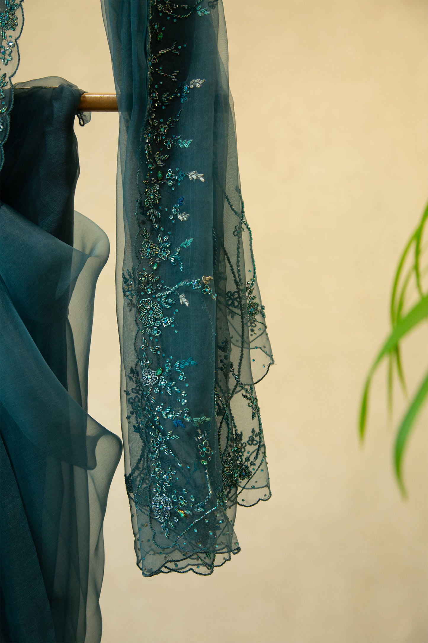 Teal green organza saree