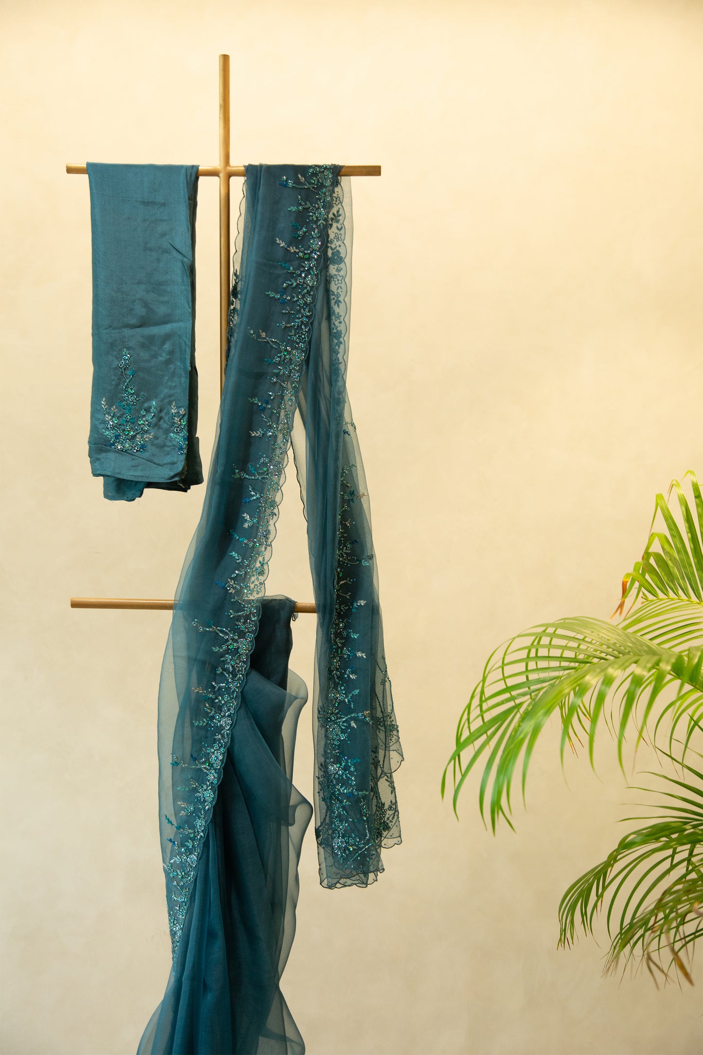 Teal green organza saree